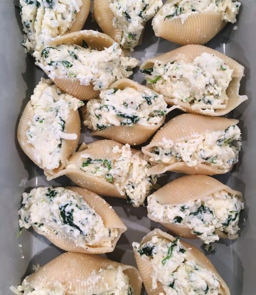 Filling the shells for the Meatballs and sauce with stuffed shells