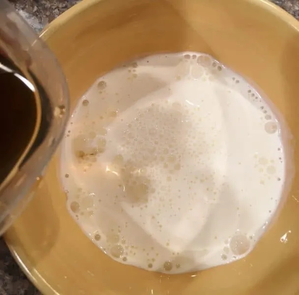 Mixing the french toast batter for dipping. Milk, cream, vanilla, and eggs