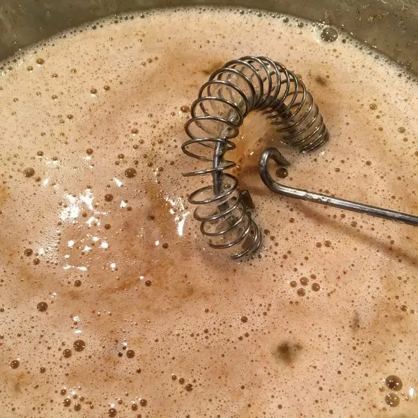 adding milk and liquids to french toast batter