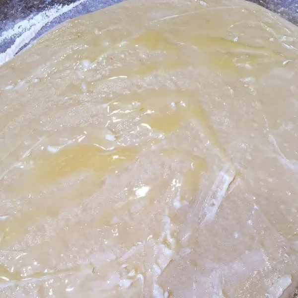 Dough brushed with melted butter
