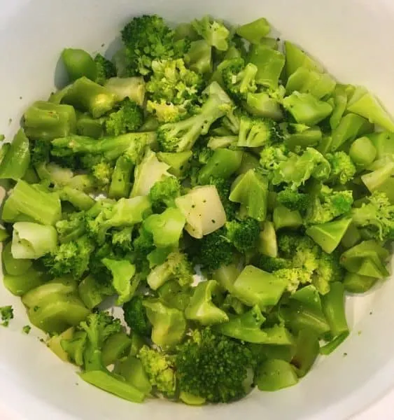 Cooked chopped broccoli in a bowl