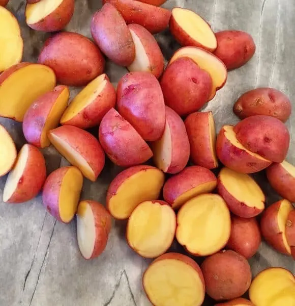 Baby Red Potatoes slice in half for Corn Beef and Cabbage