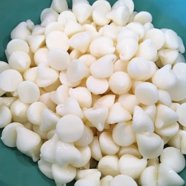 White chocolate chips in a bowl after microwaving