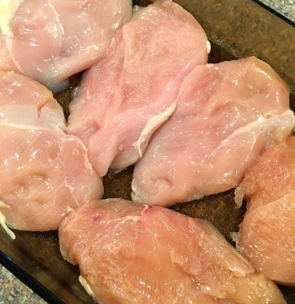 Fillet chicken breast in a 9 x 13 baking dish.