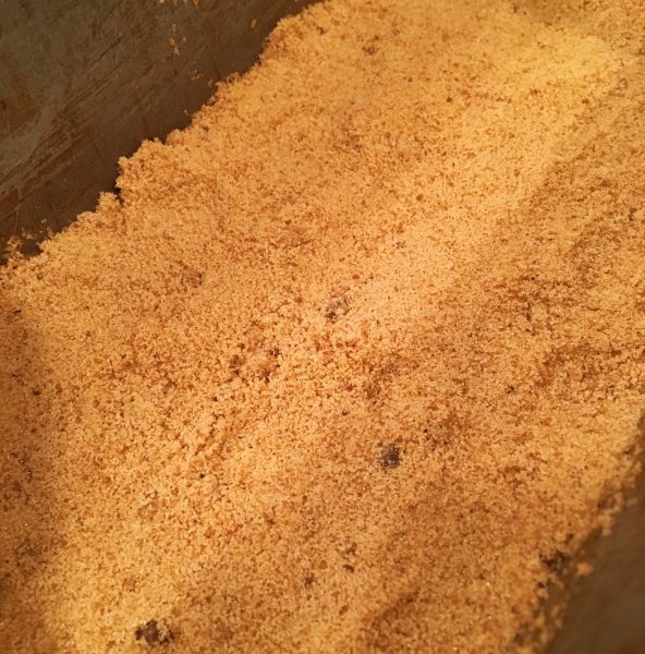 Brown sugar pressed into bottom of loaf pan for brown sugar glaze