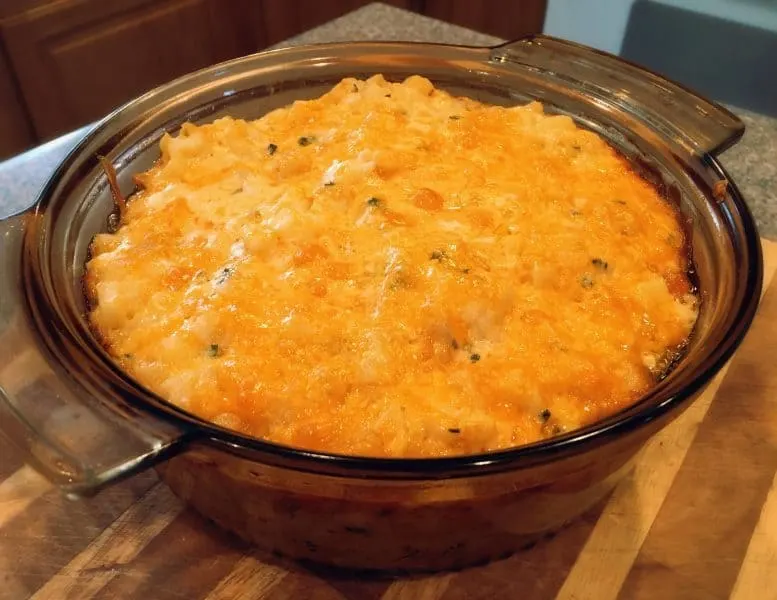 Casserole Dish filled with the Best Cheesy Funeral Potatoes