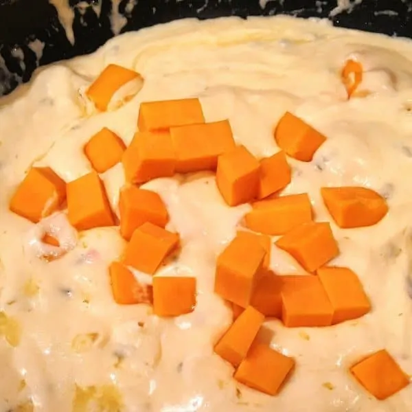Adding Cheese to Cream Sauce for Potatoes