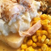 Chicken, corn, mashed potatoes and gravy