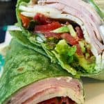 California Club Turkey Wrap cut in half.