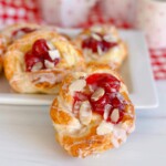 Cherry Cream Cheese Knots piled on a plate.