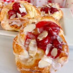 Cherry Cream Cheese Knots on a white serving platter.