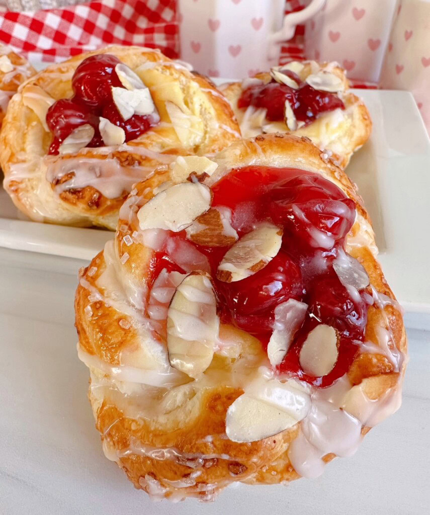 Cherry Cream Cheese Knots on a white serving platter.