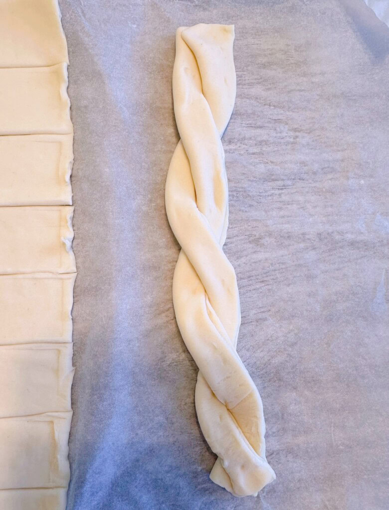 Strips of puff pastry twisted together.