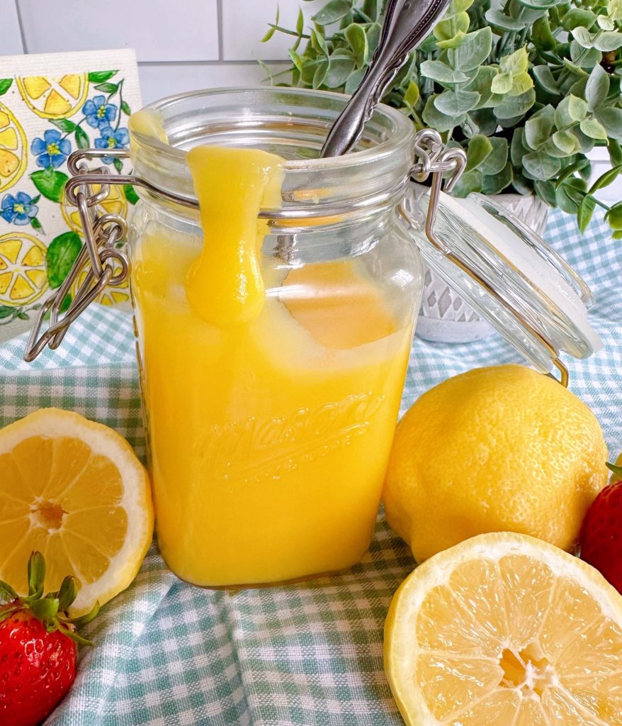 Lemon Curd running down the jar.