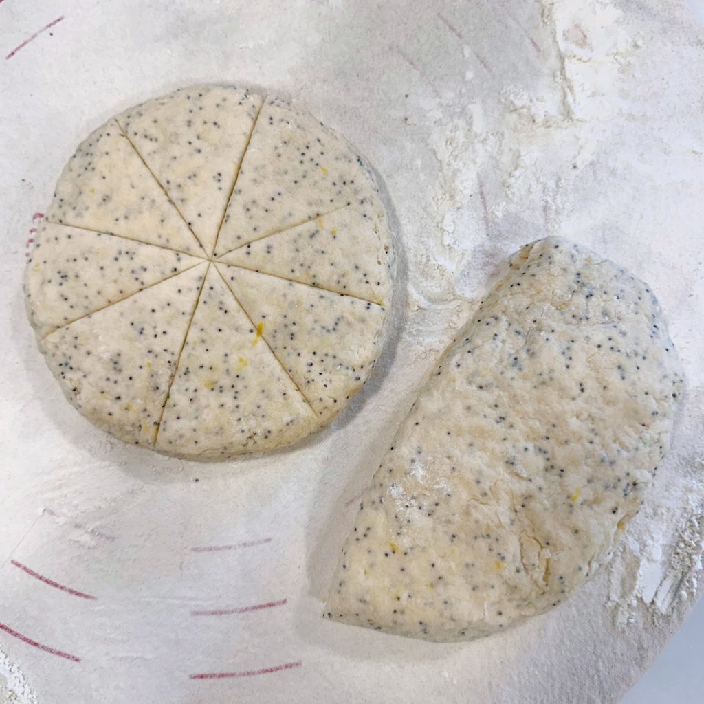 Dough divided in half and cut into triangles.