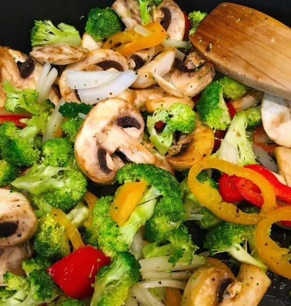 sauteed veggies in a pan for quiche