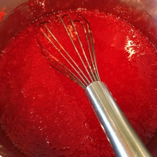 strawberry glaze on the stove boiling 