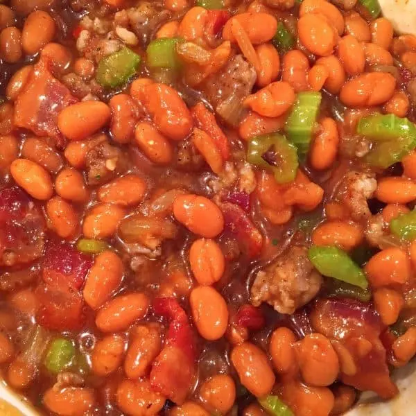 Baked Beans loaded with meat and veggies in a slow cooker