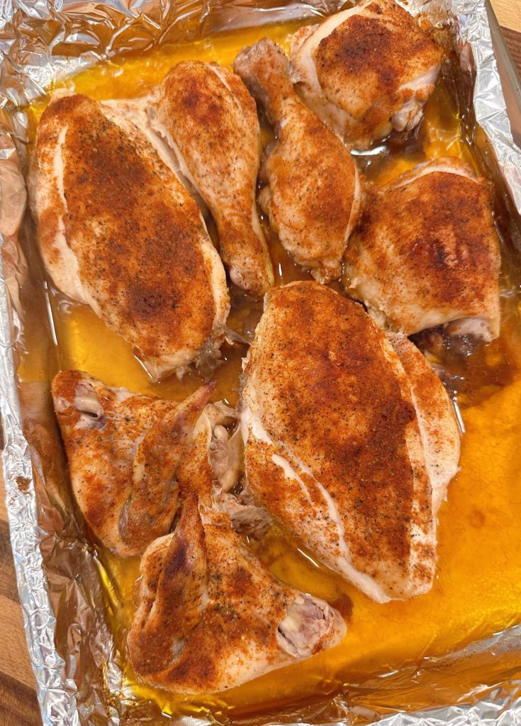 Baked chicken in a casserole dish.