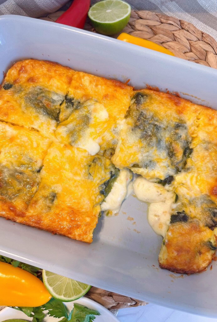 Baked chili relleno casserole cut into squares.