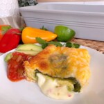 Chili Relleno casserole serving with lots of cheese oozing out!