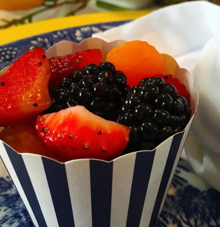 Honey Poppy Seed Fruit salad in a cute serving cup.