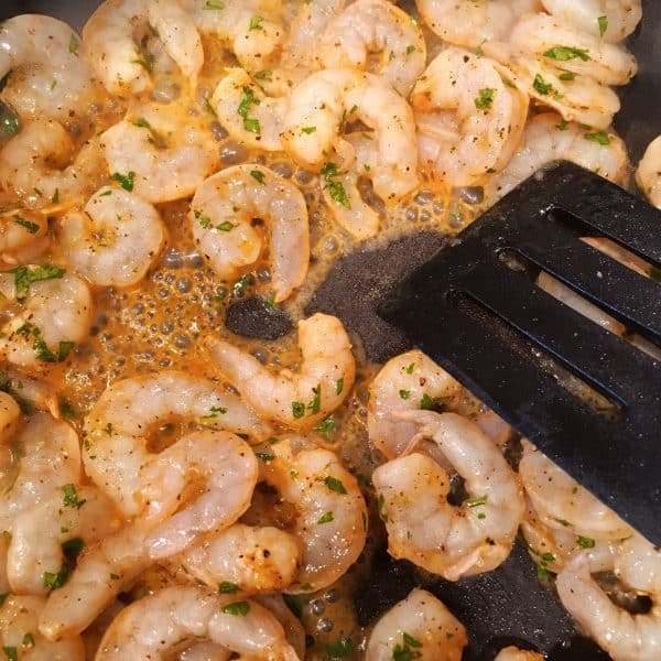 Shrimp cooking in skillet 