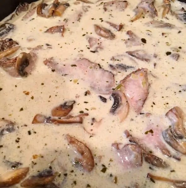 cream sauce added to steak and mushroom mixture