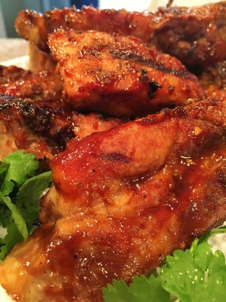 Country Pork Ribs with BBQ sauce on a serving platter