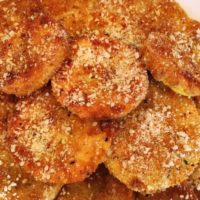 Sliced squash that is breaded and fried