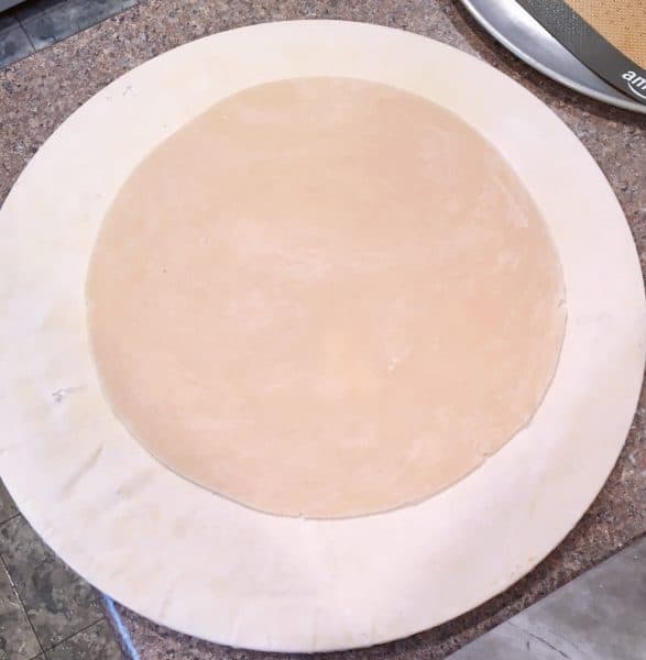 dough cut into a circle for galette