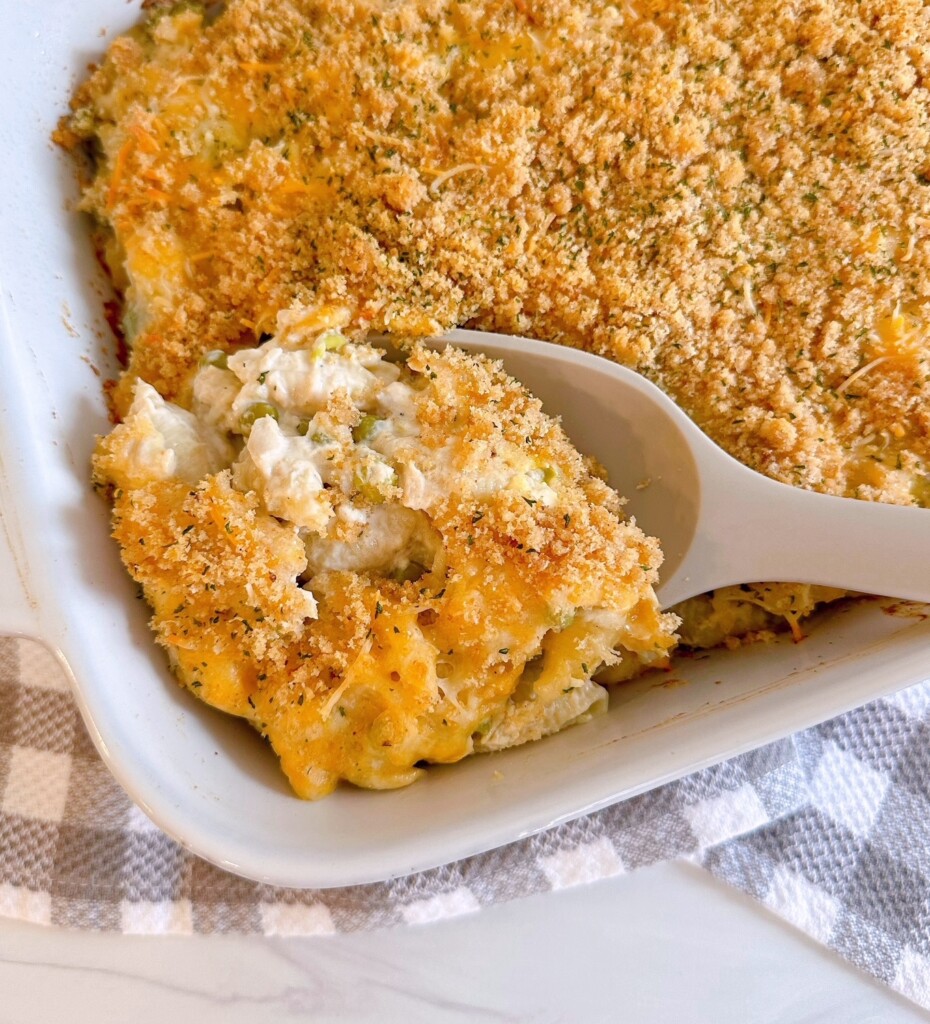Baked Tuna Noodle Casserole with a serving spoon.
