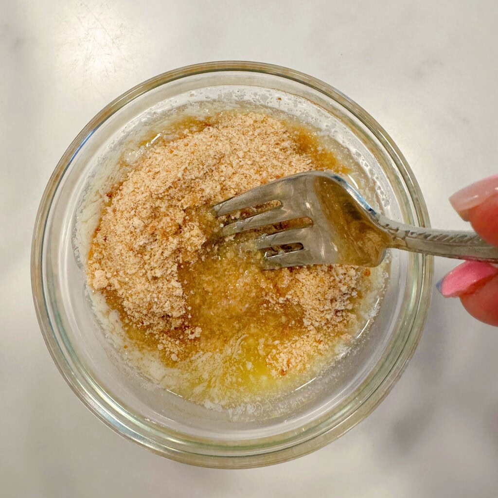 Making breadcrumb topping.