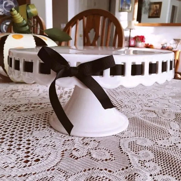 cake plate with black ribbon