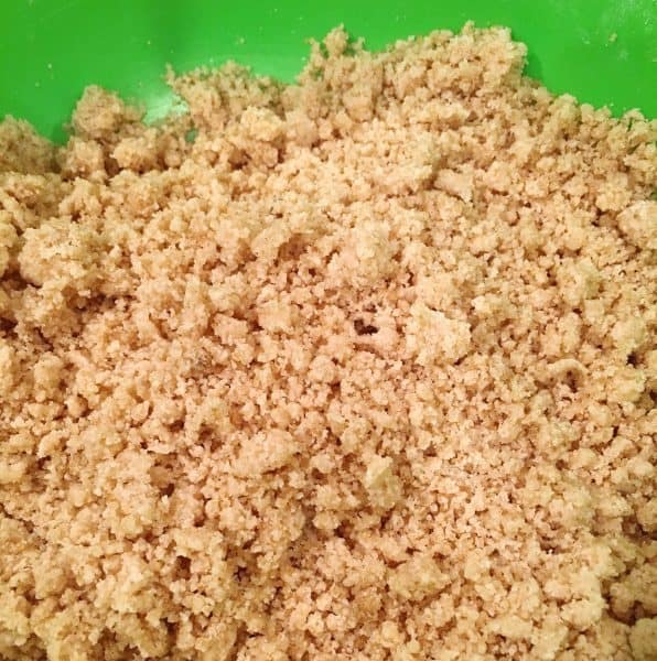 crumb topping mixture in bowl ready to go on top of pie