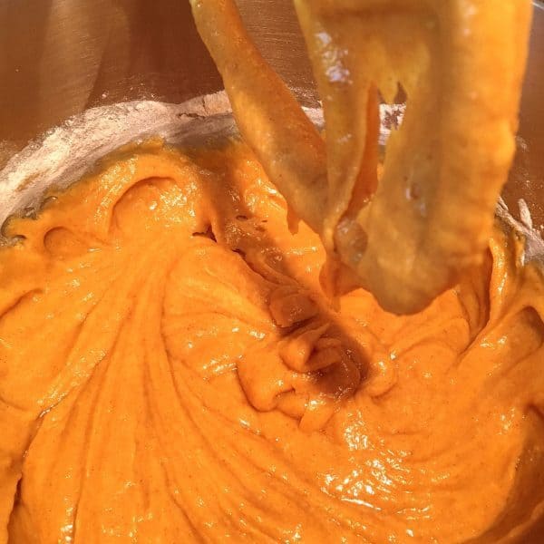 Pumpkin cake batter in mixer bowl