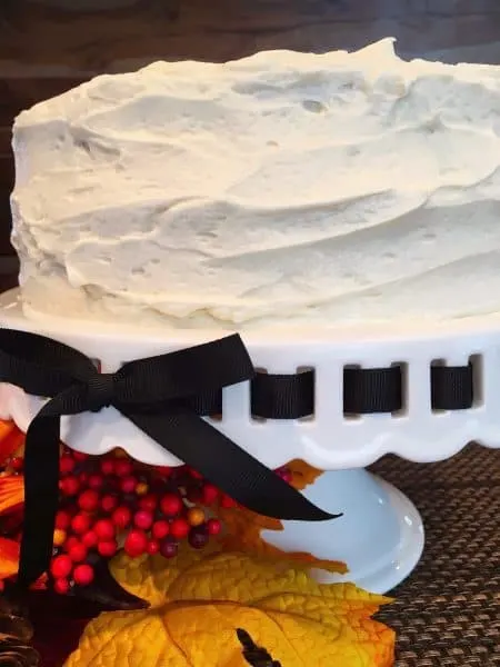 pumpkin cake frosted with cream cheese frosting