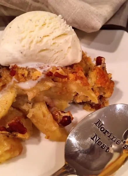 Serving of Apple Pecan Cobbler with ice cream 