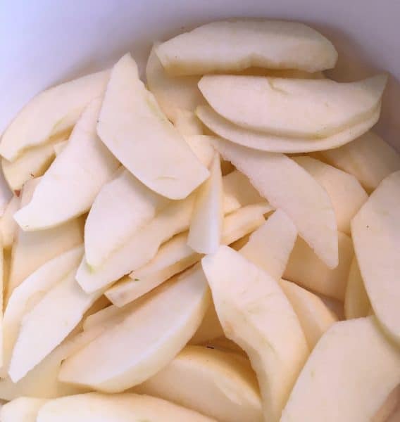 Apples sliced and in a baking dish