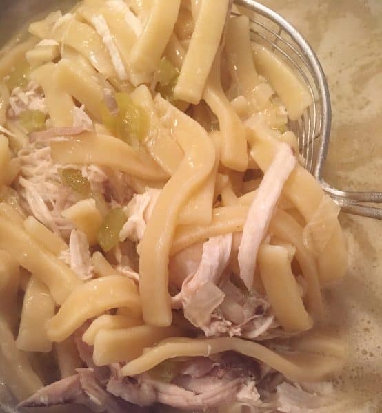 adding grandmas' frozen noodles for chicken noodle soup.