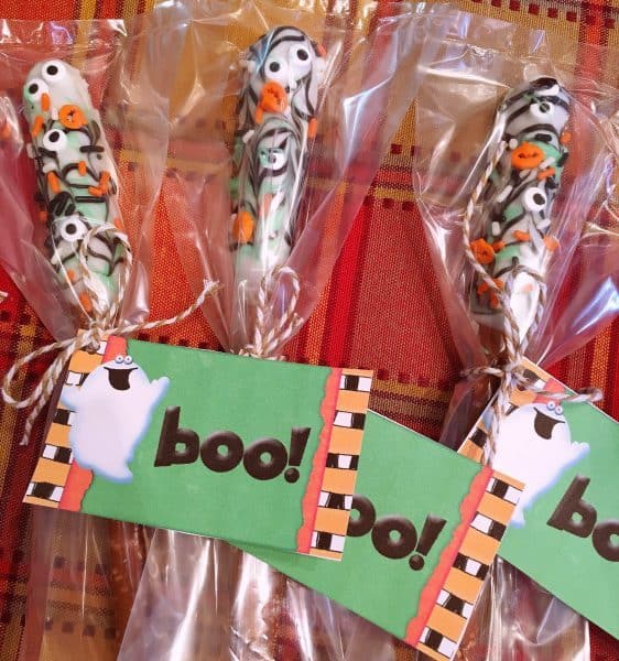 Caramel Chocolate Pretzel Sticks wrapped and tagged to give as gifts
