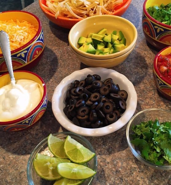 Taco topping bar...olives, avocados, cheese, sour cream, chips and more