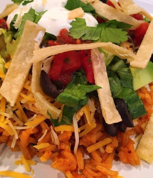 Mexican Haystacks with Spanish Rice at the base