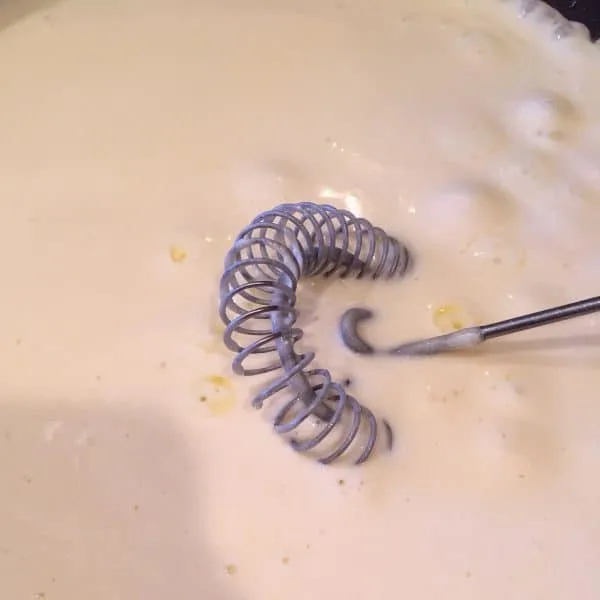 Creamy Alfredo Sauce in pan