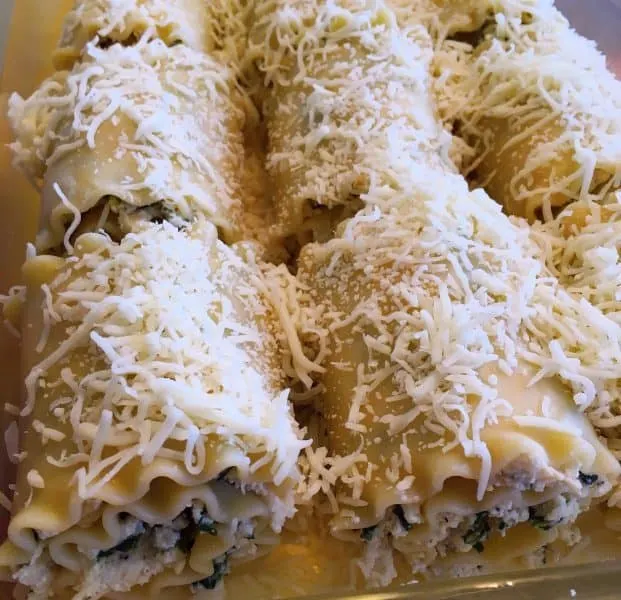 More Mozzarella Cheese sprinkled on top of roll ups