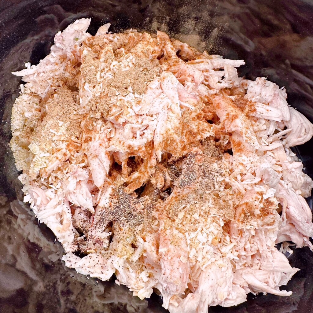 Seasonings and spices added to chicken.