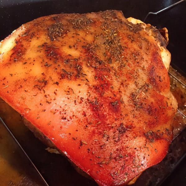 Pork roast with herbs and seasonings in a slow cooker