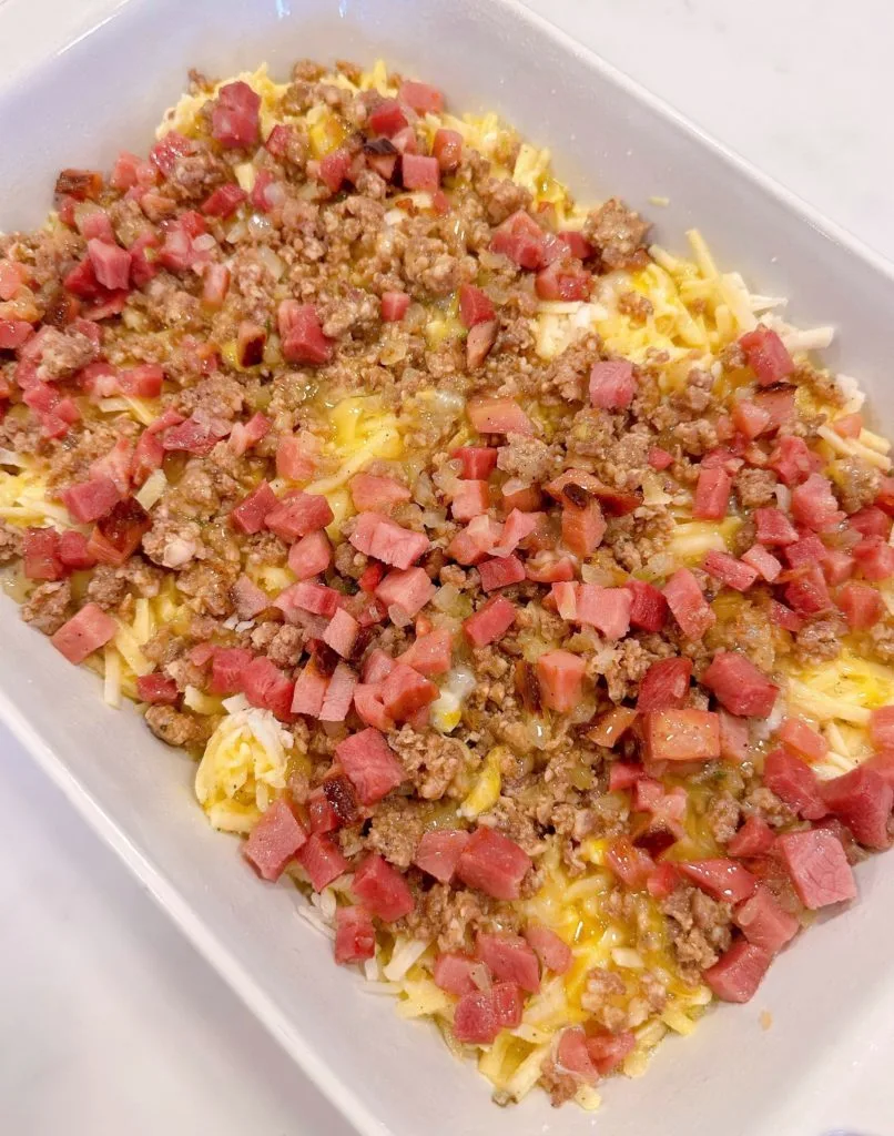 Breakfast casserole with egg mixture mixed in.