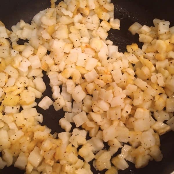 Frozen Country Hashbrowns being fried in a skillet