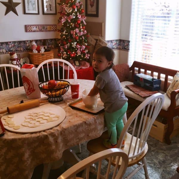 Granddaughter helping make cookies